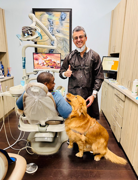 Doctor treating a patient at Austin Dental Plus